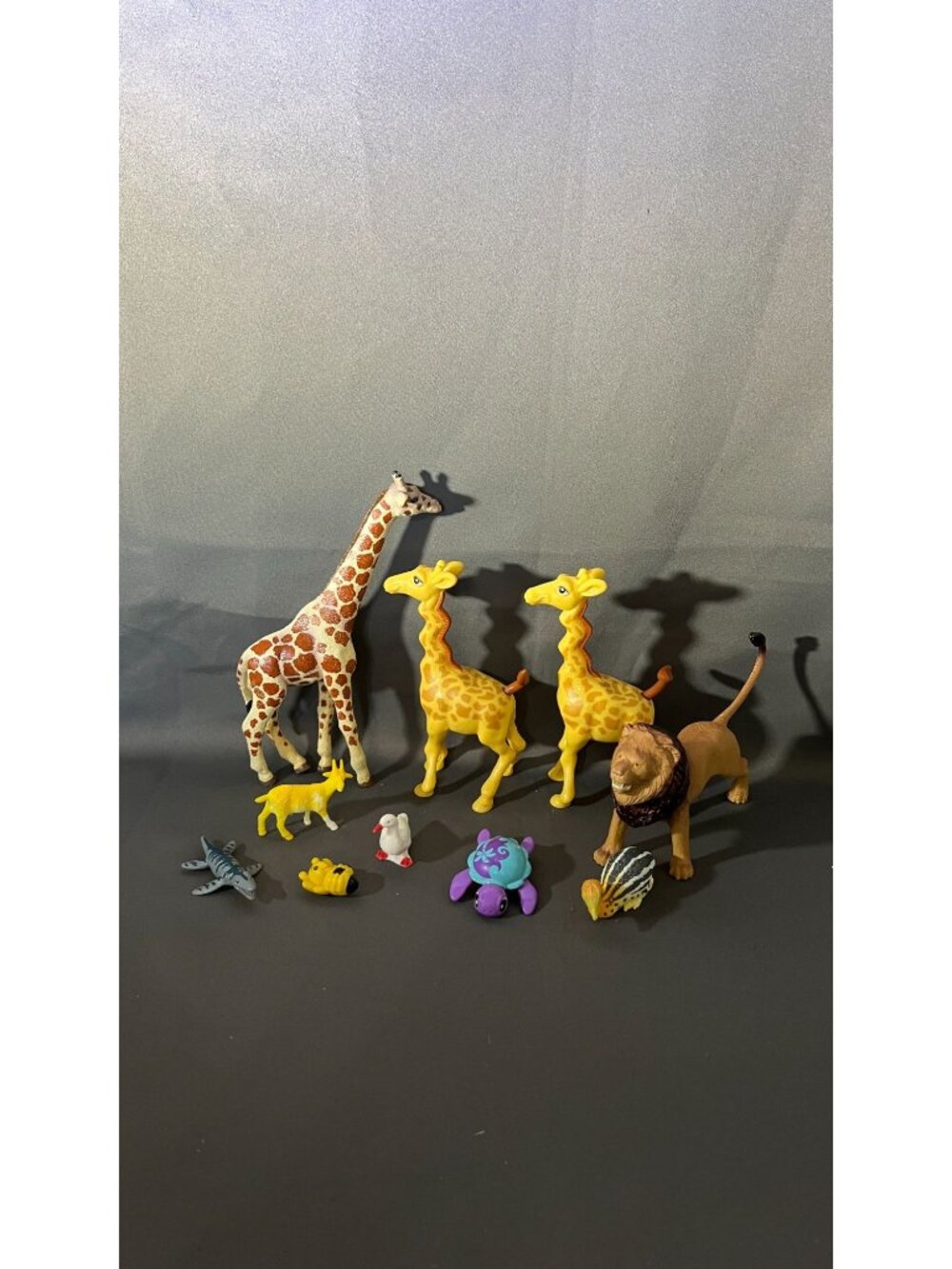 Assorted Animal Figurines Lot Includes Giraffes Lion Shark Goat Bee & More